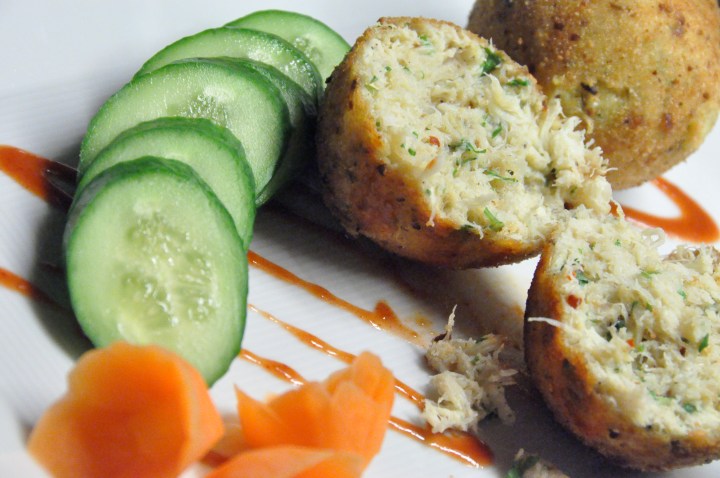 Crabmeat Balls served with slices of Cucumber, florets of Carrot and Sriracha Chilli Sauce.